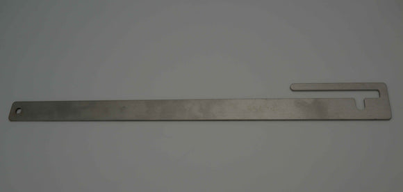 Levier de verrouillage pour couvercle de puits